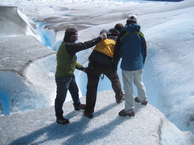 Looking down a very deep crevasse