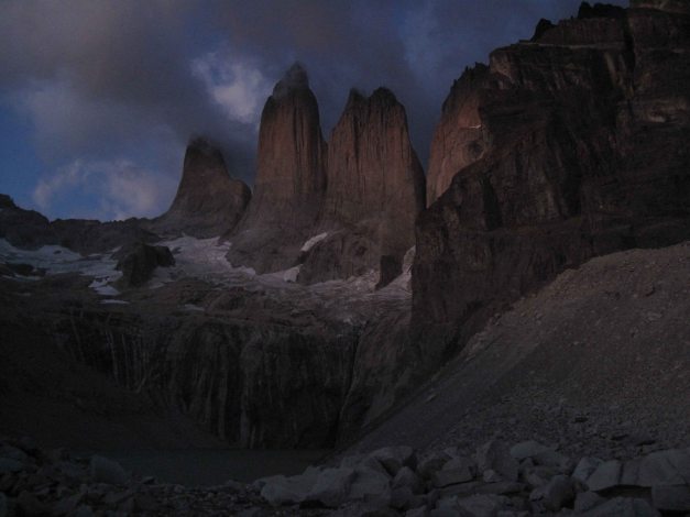 The 4 Torres lit by early rays of sun